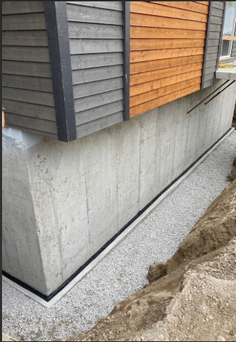 Après - fondation propre et drain installé